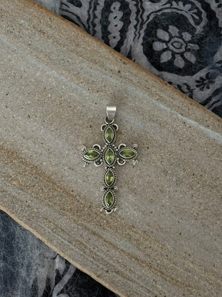 statement peridot cross pendant
