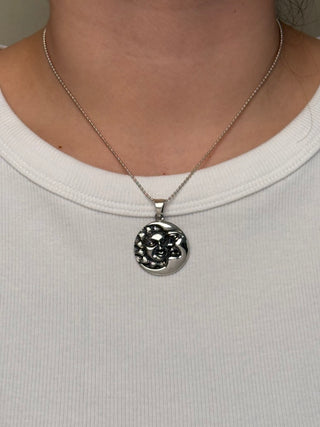 celestial moon and sun pendant