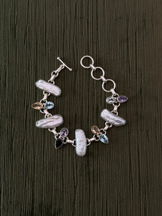 statement baroque pearl and multi gemstone bracelet