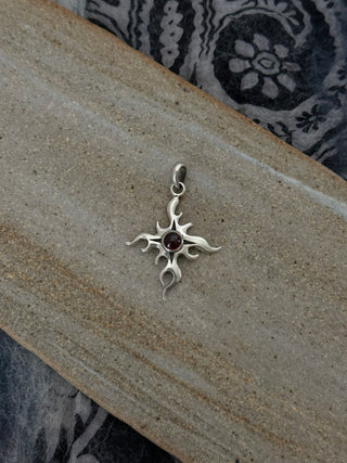garnet burning star pendant