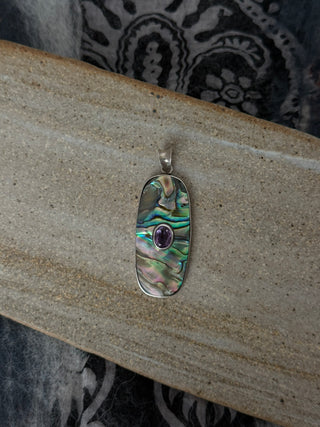 statement abalone pendant with an Amethyst center