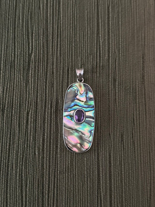 statement abalone pendant with an Amethyst center