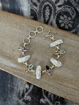 statement baroque pearl and multi gemstone bracelet