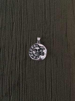 celestial moon and sun pendant