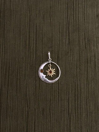 celestial moon with a dangling star pendant