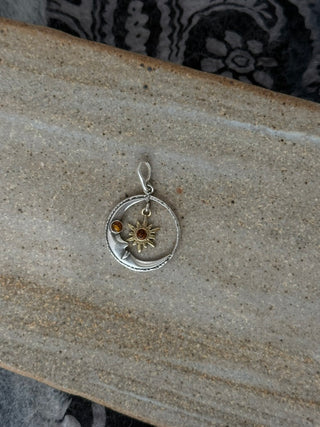 celestial moon with a dangling star pendant
