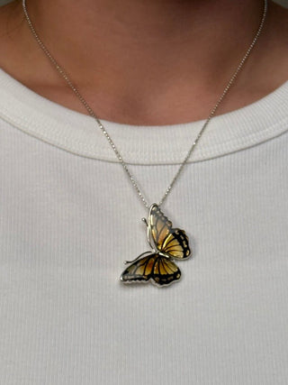 hand-carved amber butterfly pendant - Chula Co.