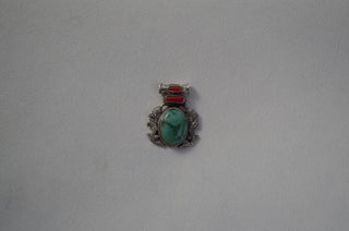 ornate double dragon pendant