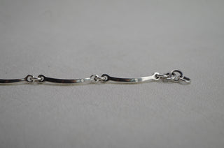 curved bar link bracelet