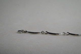 curved bar link bracelet