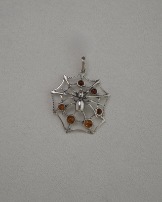 amber spider web pendant